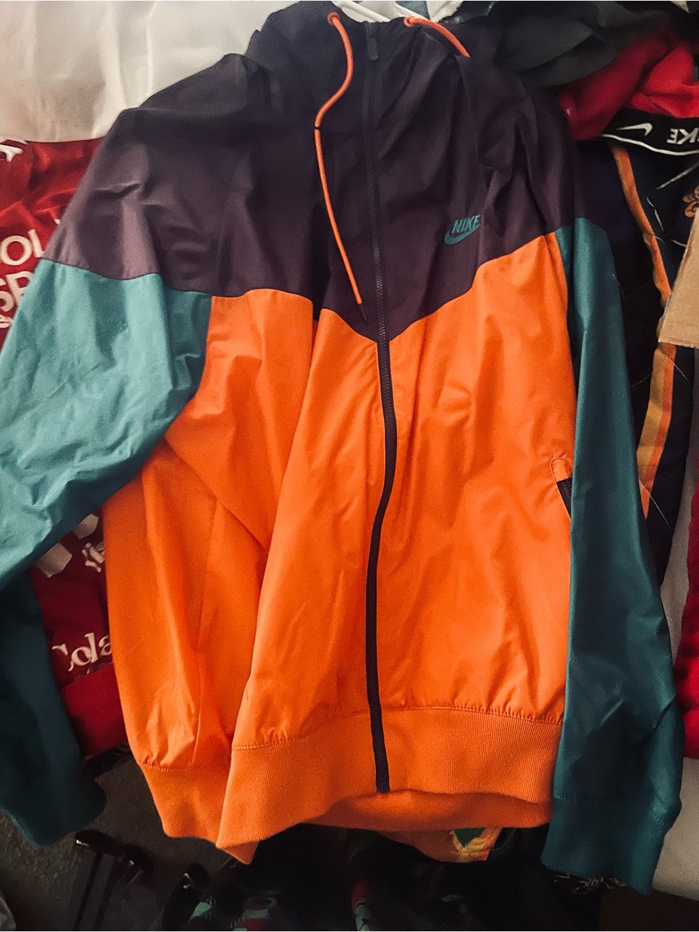 Nike Men's Starfish Colorway Windbreaker Jacket in Orange, Teal & Purple